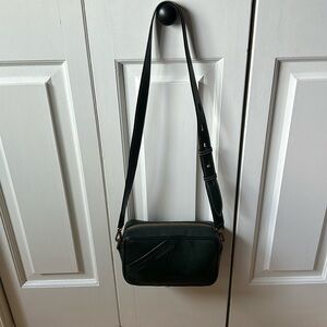 Golden Goose deep green star zip leather crossbody bag in a like new condition
